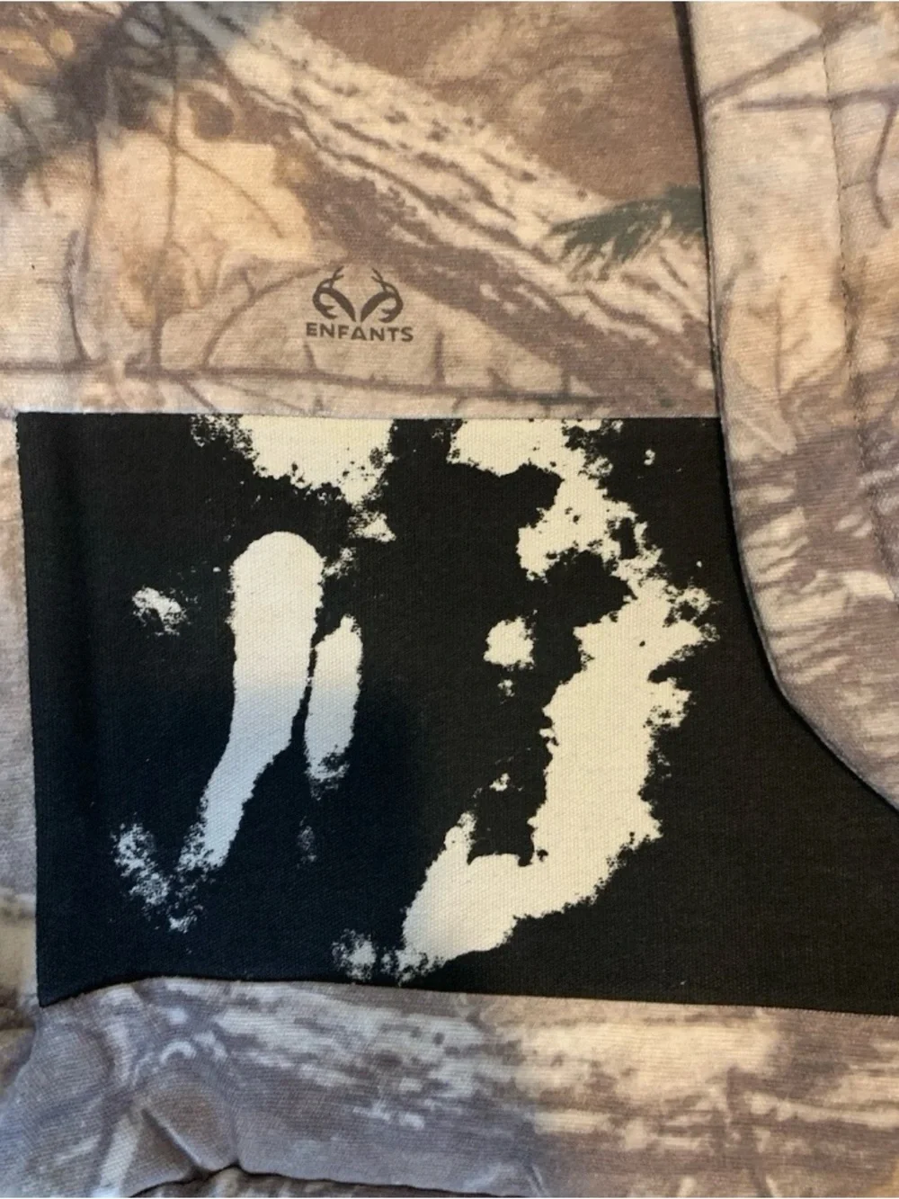 'The Mystery of Tap Water' Beige Camouflage Backpack